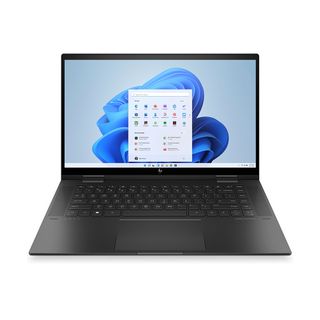 An open and powered on laptop against a white background.