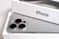 iPhone with camera bump in box