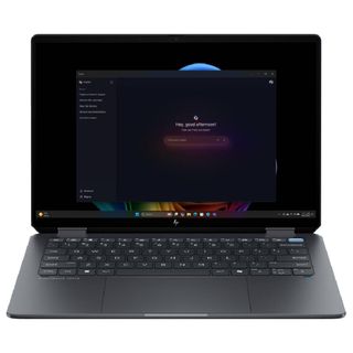 An open and powered on laptop against a white background.